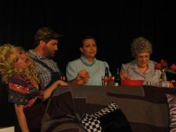 Sarah LaFantasie as Evalita, Dan Miller as Orville, Grace Erdmann as Lurleen, and Sherry Bendt as Mama Wheelis